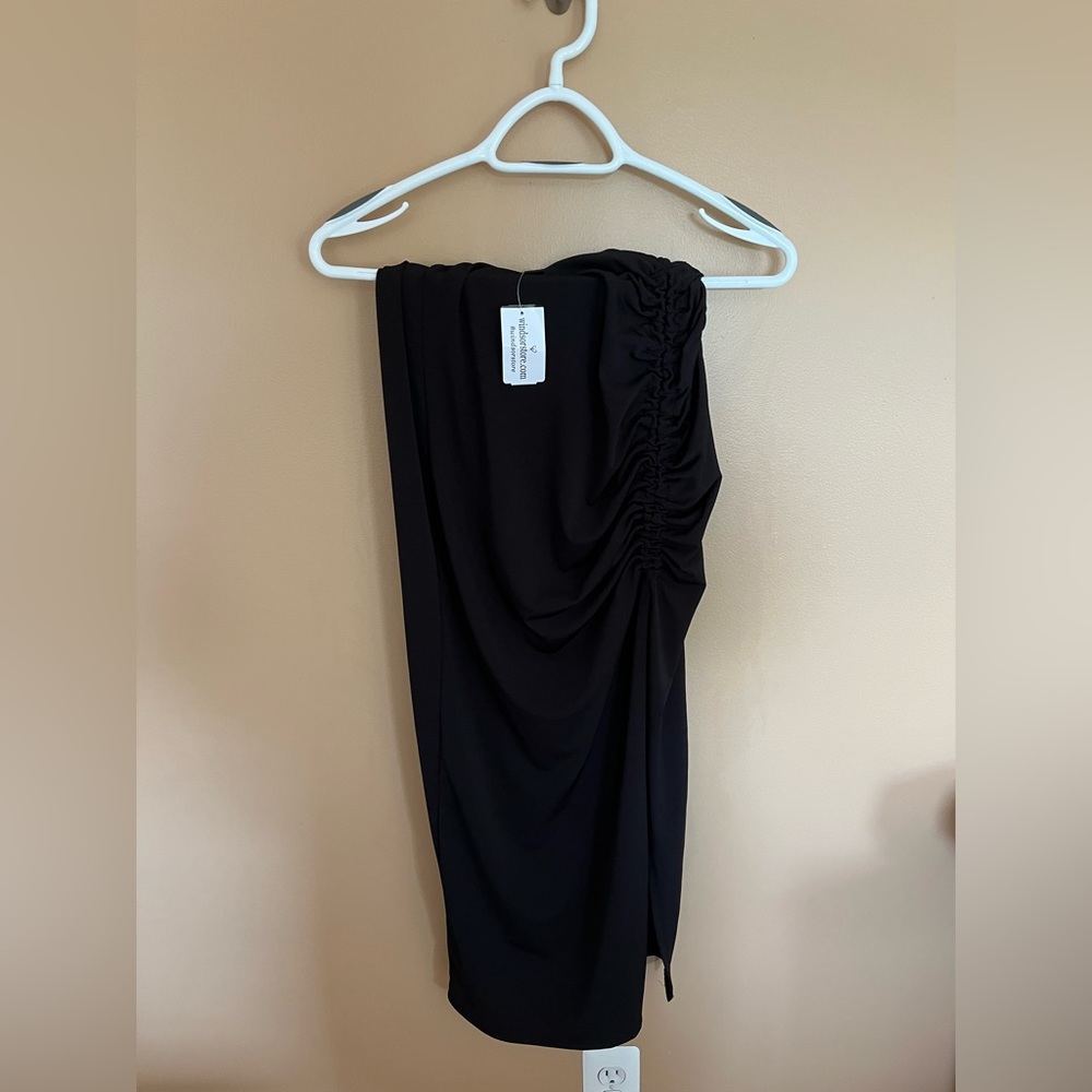 Size medium long black Windsor skirt. Never been worn.
